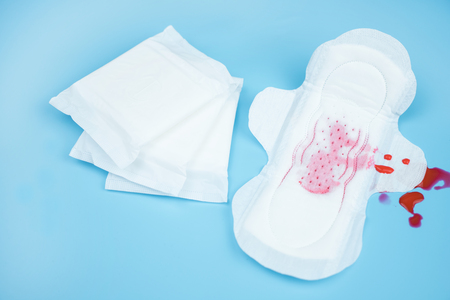 How are period pads designed to absorb menstrual blood